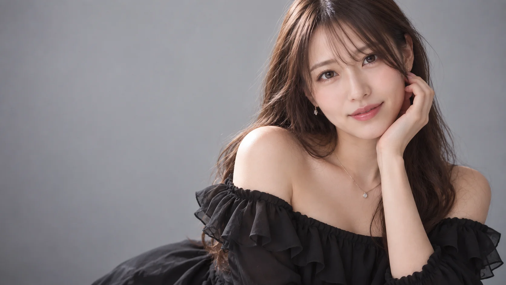 黒のオフショルの服を着た唯さんのポートレート